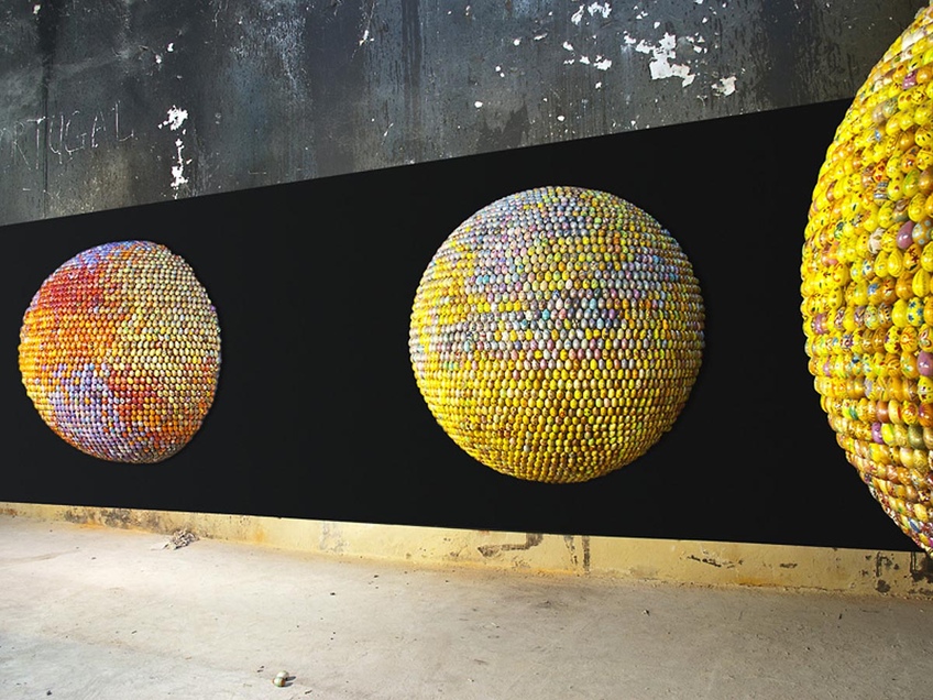 Spheres on a black panel